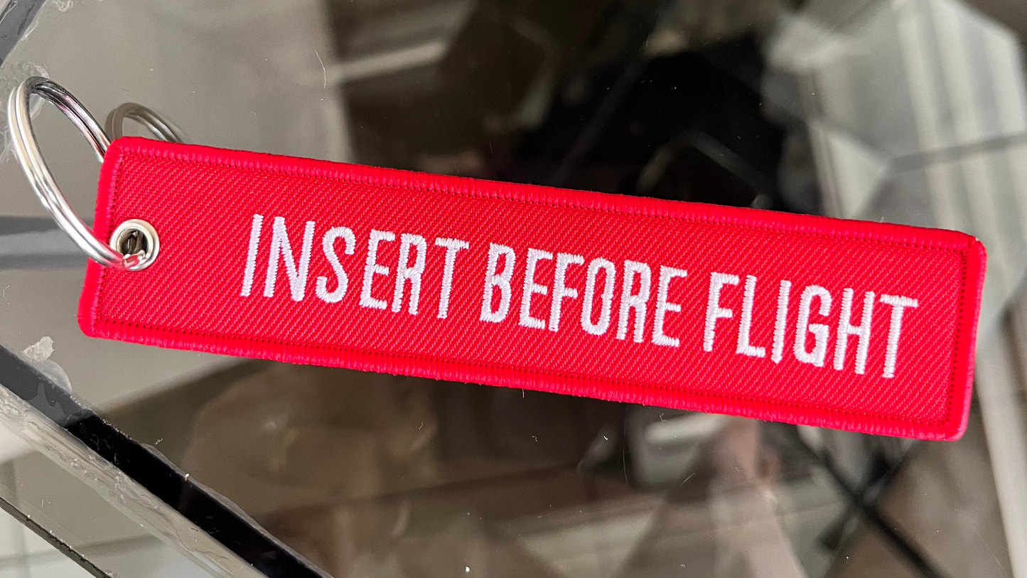 Llavero Insert Before Flight